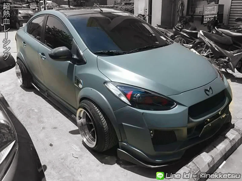 รูปชุดแต่ง ชุดแต่ง Mazda Mazda2 2009 2014 GTR 4 ประตู ภาพที่ 12
