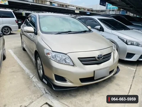 Toyota Corolla Altis E140 มุมด้านหน้า แสดงลิ้นต่อกันชนหน้าติดตั้งบนรถ