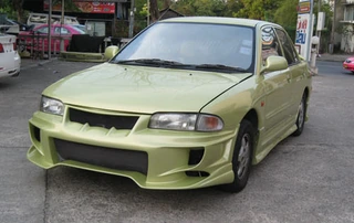 ชุดแต่ง Mitsubishi Lancer E-Car 1992–1995 ทรง Veilside มุมหน้าเฉียง