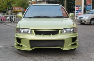 ชุดแต่ง Mitsubishi Lancer E-Car 1992–1995 ทรง Veilside ภาพมุมที่ 2