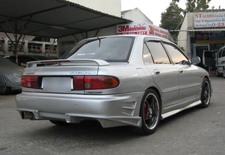 ชุดแต่ง Mitsubishi Lancer E-Car 1992–1995 ทรง Veilside ภาพมุมที่ 4