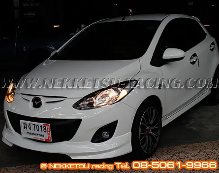 ชุดแต่งรอบคัน Mazda2 ร่น 5 ประตู ทรง Firewall ABS – ภาพที่ 11