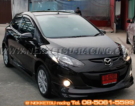 ชุดแต่งรอบคัน Mazda2 ร่น 5 ประตู ทรง Firewall ABS – ภาพที่ 3