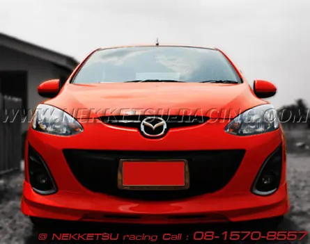 ชุดแต่งรอบคัน Mazda2 ร่น 4 ประตู ทรง Firewall ABS – ภาพที่ 2