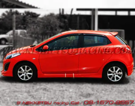 ชุดแต่งรอบคัน Mazda2 ร่น 5 ประตู ทรง Firewall ABS – ภาพที่ 18