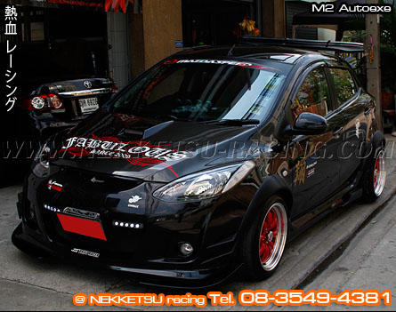 ชุดแต่งรอบคัน Mazda2 ทรง AutoExe V.1 – ภาพที่ 5