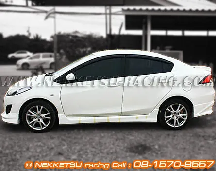 ชุดแต่งรอบคัน Mazda2 ร่น 4 ประตู ทรง Firewall ABS – ภาพที่ 6