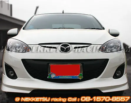 ชุดแต่งรอบคัน Mazda2 ร่น 4 ประตู ทรง Firewall ABS – ภาพที่ 4